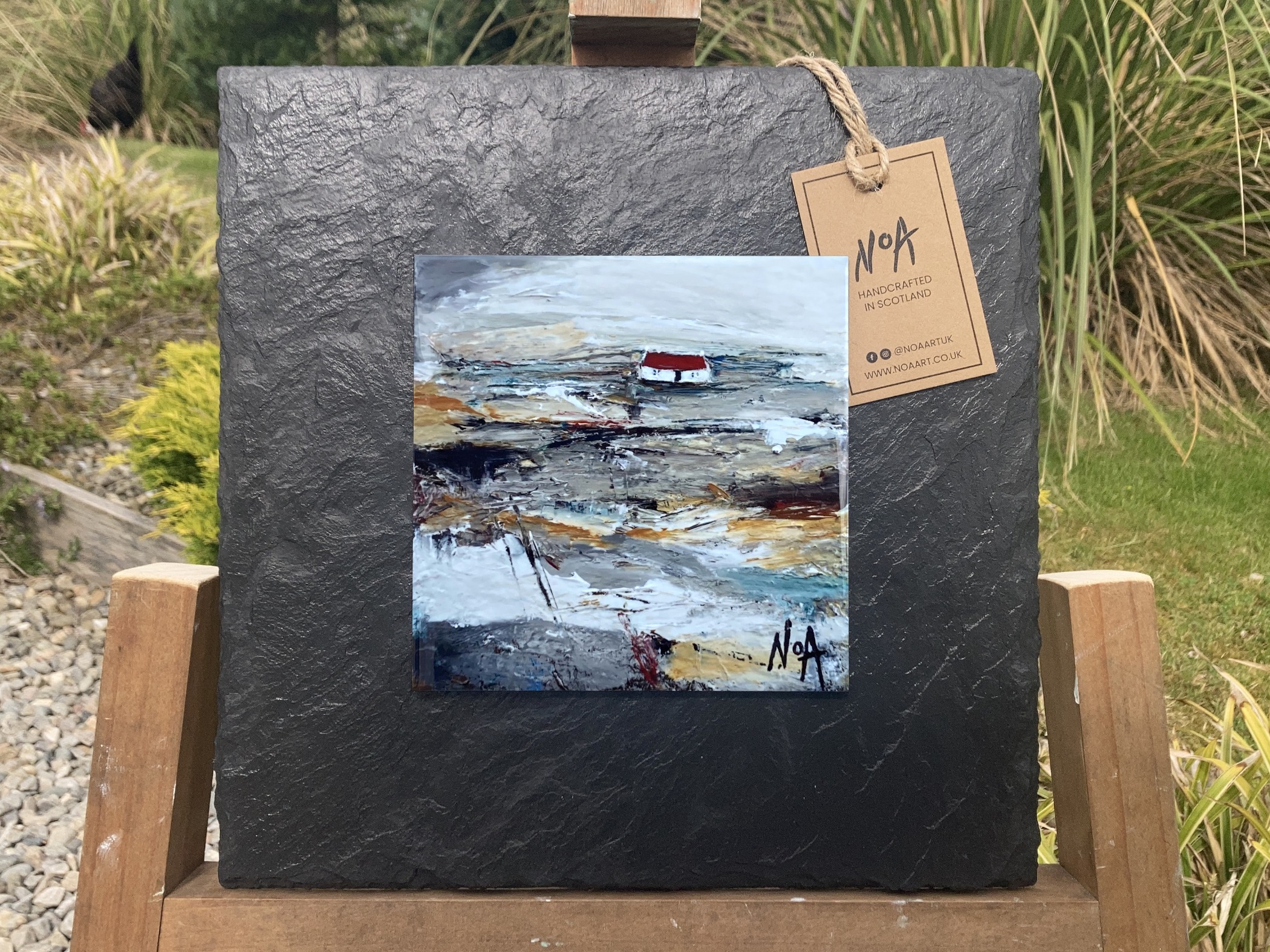 Slate mounted ceramic tile wall art print of red, yellow and grey Scottish landscape painting featuring Highland glen and bothy cottage