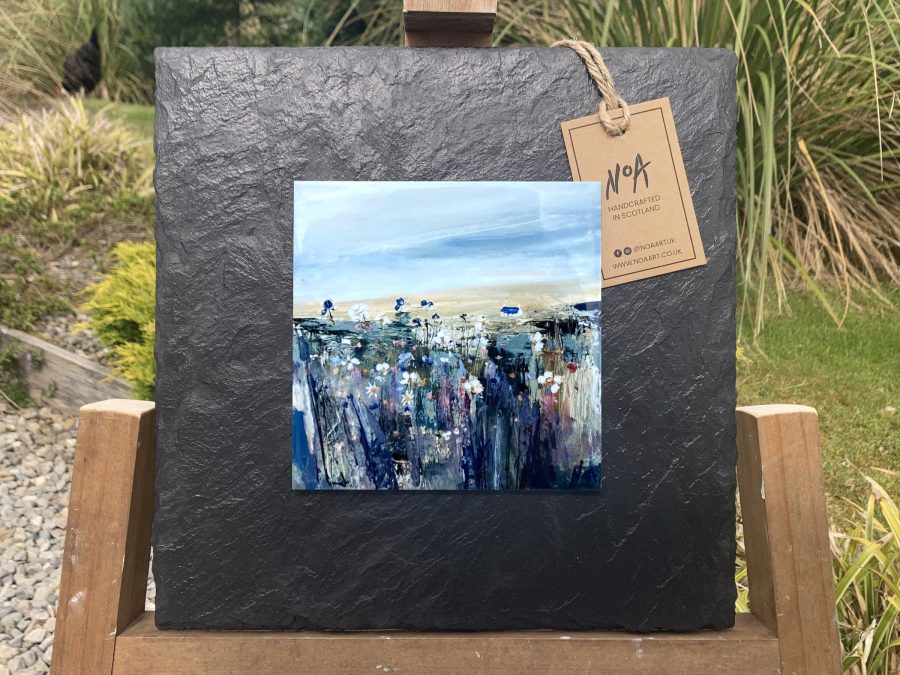 Slate mounted ceramic tile wall art print of blue and yellow Scottish landscape painting featuring Highland glen, bothy cottage and wild flowers