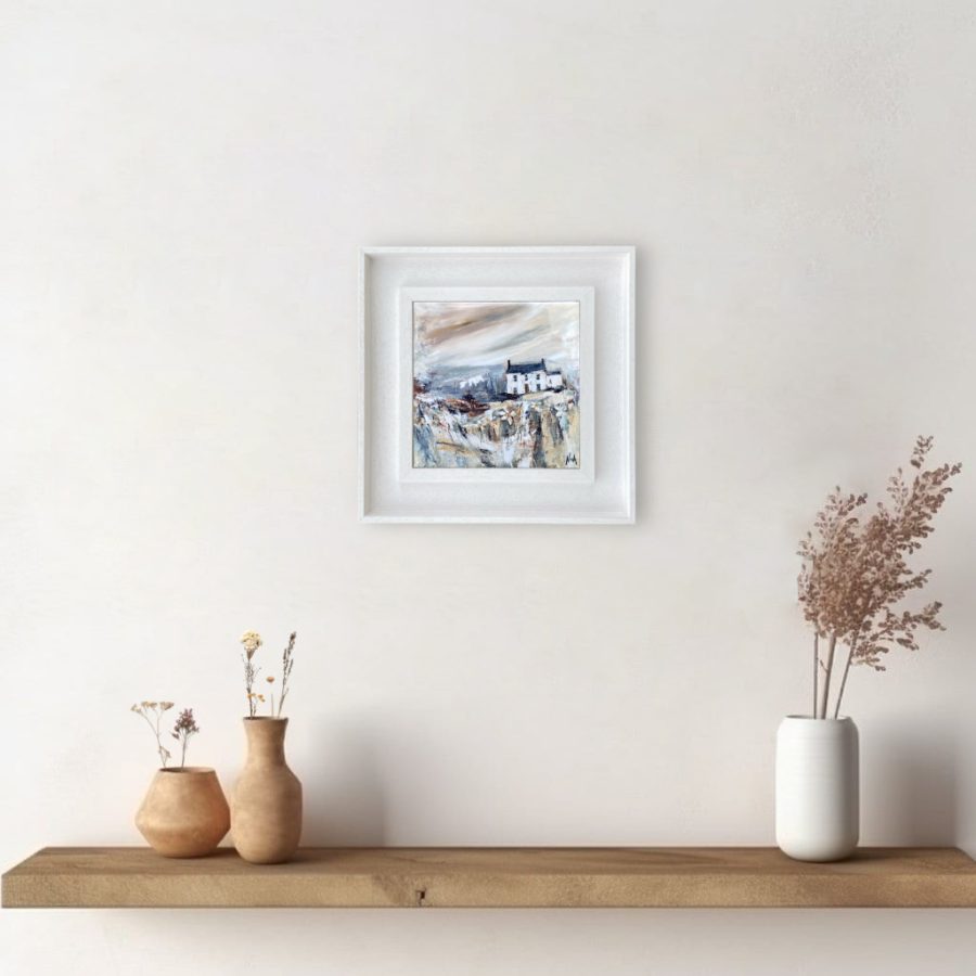 Framed ceramic tile wall art print of Scottish landscape painting featuring Highland glen and stone bothy cottage